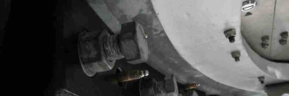 Bolts inside the tower of a wind turbine